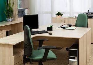 computer on a desk in a modern office